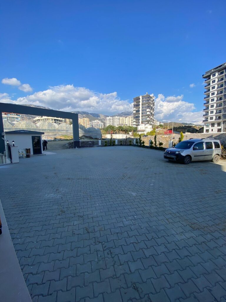 Квартира 1+1 с видом на море в жилом комплексе Travok Tower, район Махмутлар, Аланья