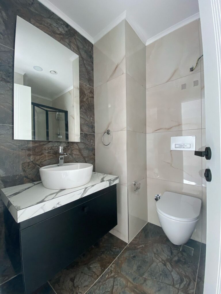 Квартира 1+1 с видом на море в жилом комплексе Travok Tower, район Махмутлар, Аланья