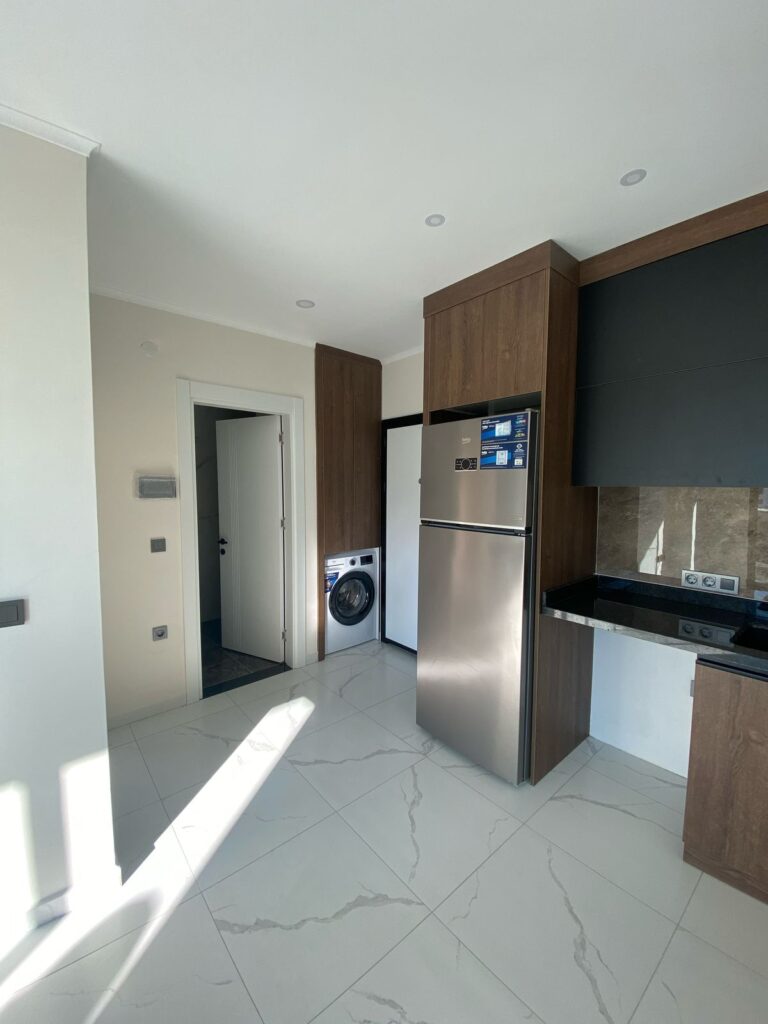 Квартира 1+1 с видом на море в жилом комплексе Travok Tower, район Махмутлар, Аланья